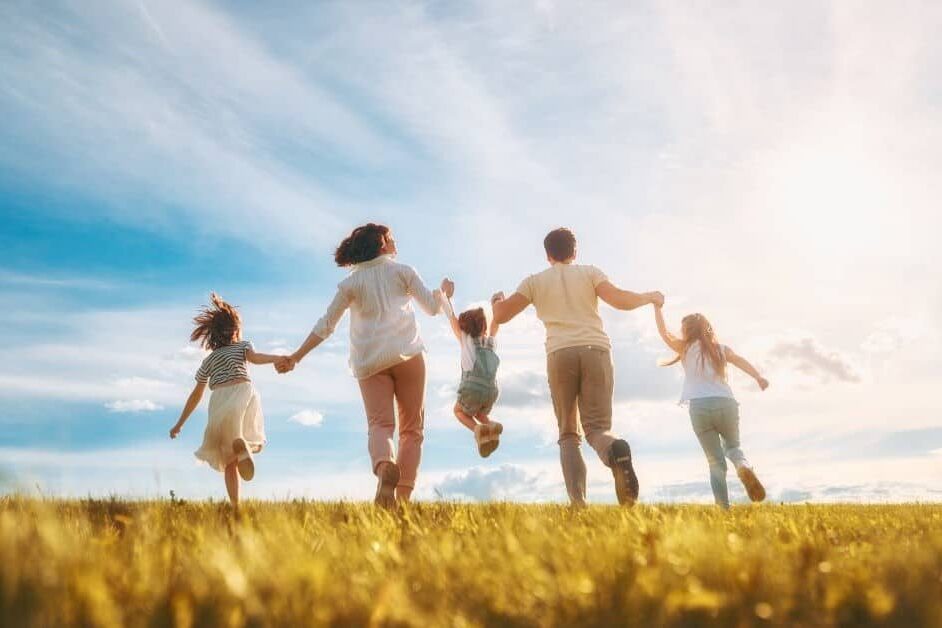 Family outside in wheat field