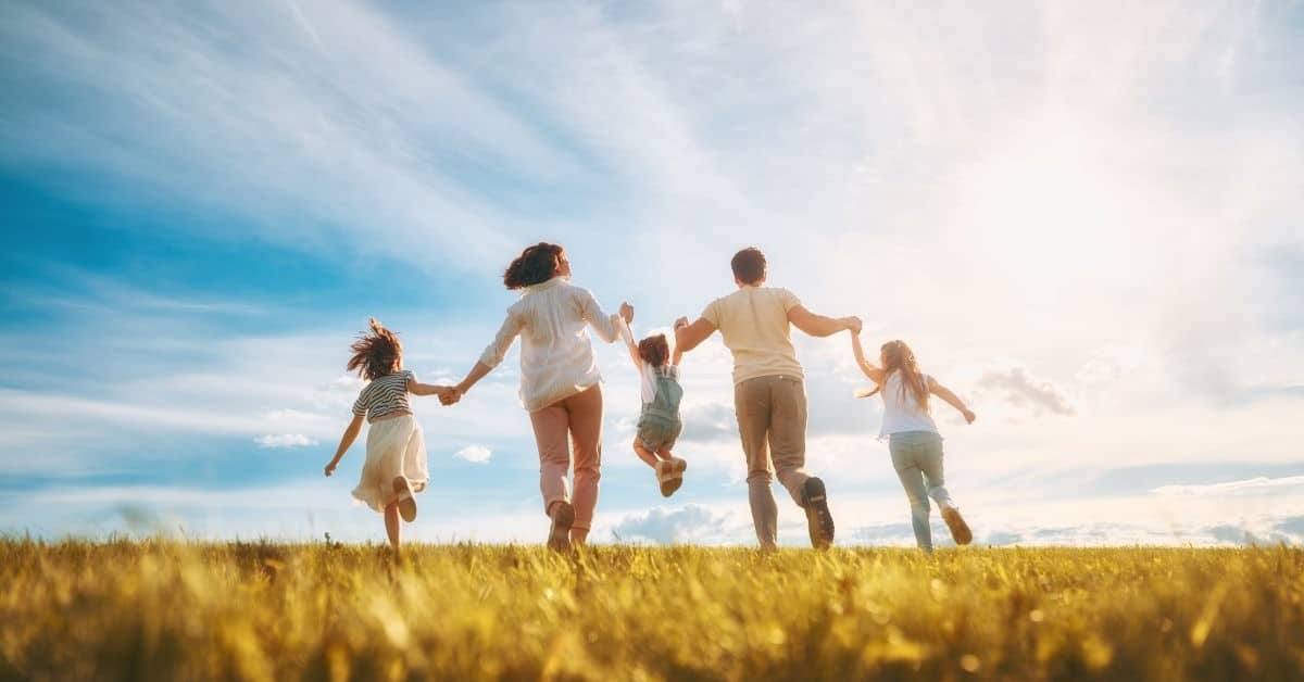 Living Will Family outside in wheat field